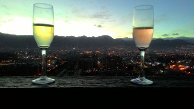 Bogotá, Colombian capital in the mountain - Admiring sunrise on mountains with champagne