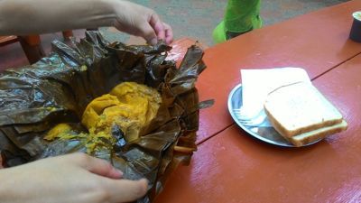 Typical cuisine on Monserrate - Tamal, typical Bogotá breakfast after church