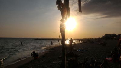 Залізний порт чорного моря захід сонця - залізо порт пляж фото